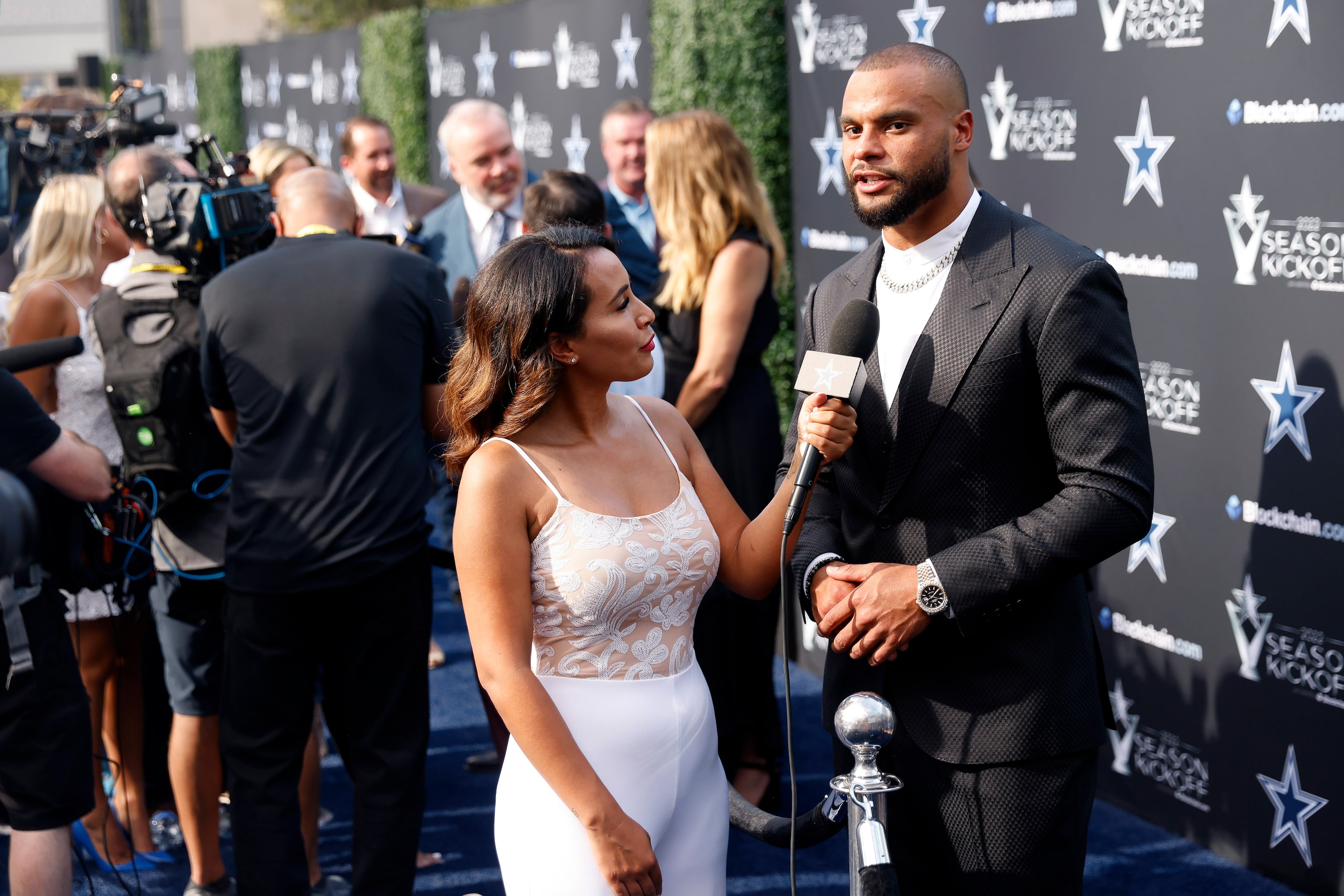 Dallas Cowboys quarterback Dak Prescott is interviewed by Brittani Johnson as he arrived on...