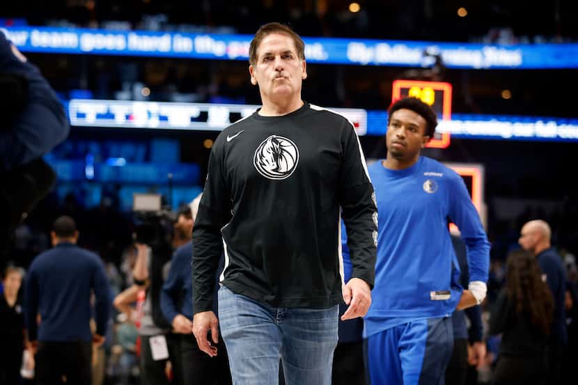 Dallas Mavericks former owner Mark Cuban leaves the floor following their loss to the New...