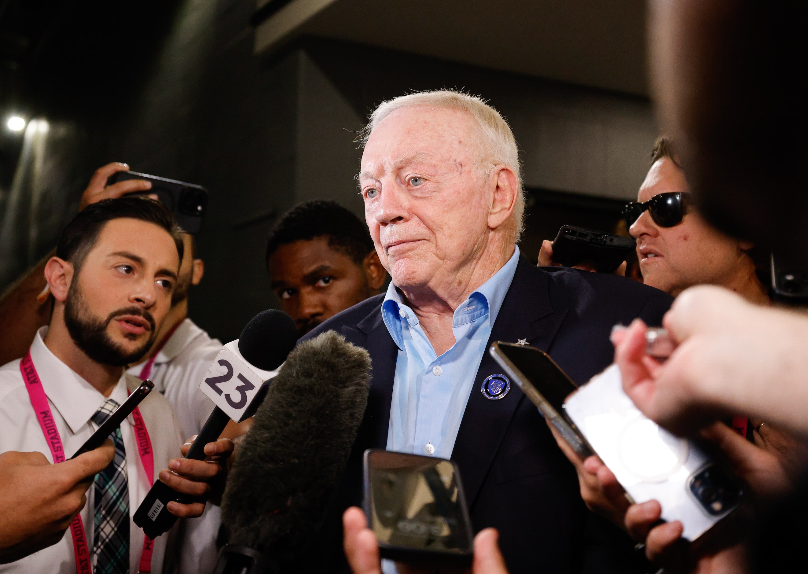 Dallas Cowboys owner Jerry Jones speaks to reporters after an NFL football game against the...