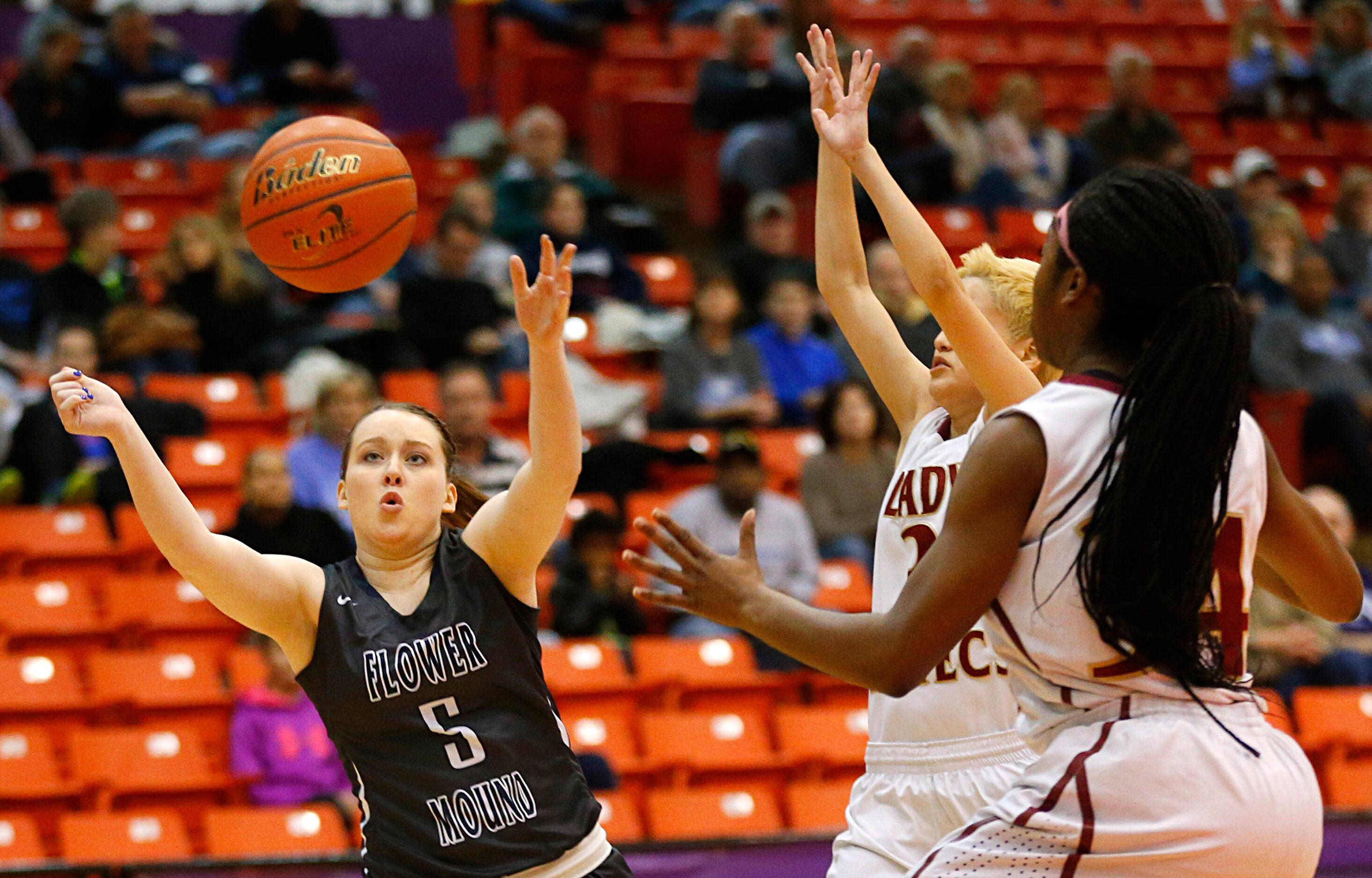 Flower Mound guard Kayla Mount looses control of the ball and turns it over to El Paso El...