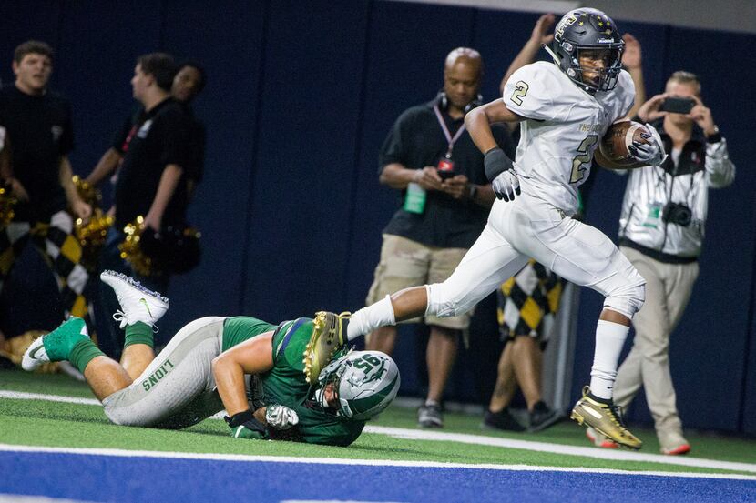 The Colony Myles Price (2) scores a touchdown against Frisco Reedy defensive tackle Brock...