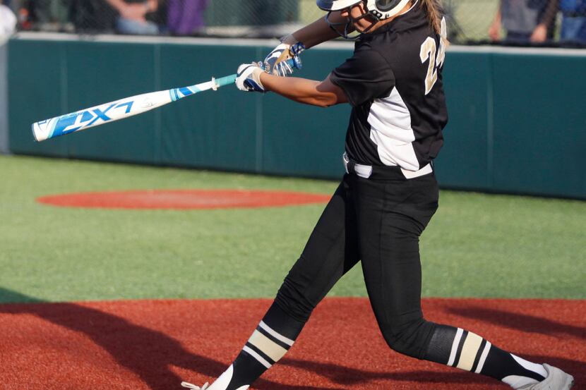 The Colony shortstop Jayda Coleman (24) hits a home run in her firs at bat, as the lead off...
