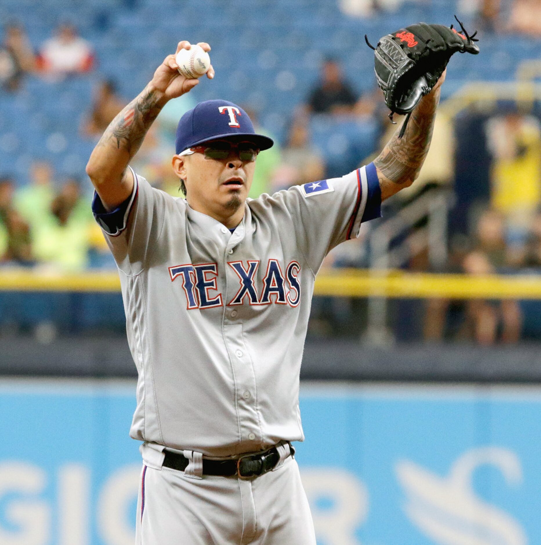 ST. PETERSBURG, FL - JUNE 30:  Jesse Chavez #53 of the Texas Rangers pauses between pitches...