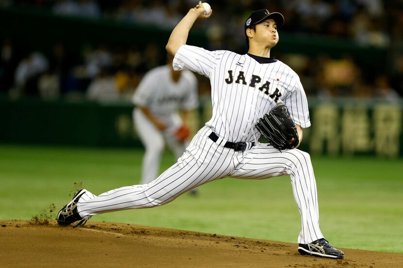FILE - In this Nov. 19, 2015, file photo, Japan's starter Shohei Otani pitches against South...