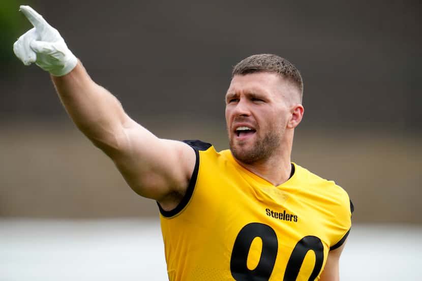 Pittsburgh Steelers linebacker T.J. Watt acknowledges fans as he takes the field for the NFL...
