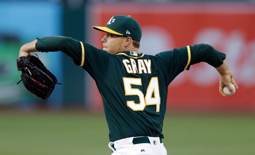 Oakland Athletics pitcher Sonny Gray works against the Atlanta Braves during the first...