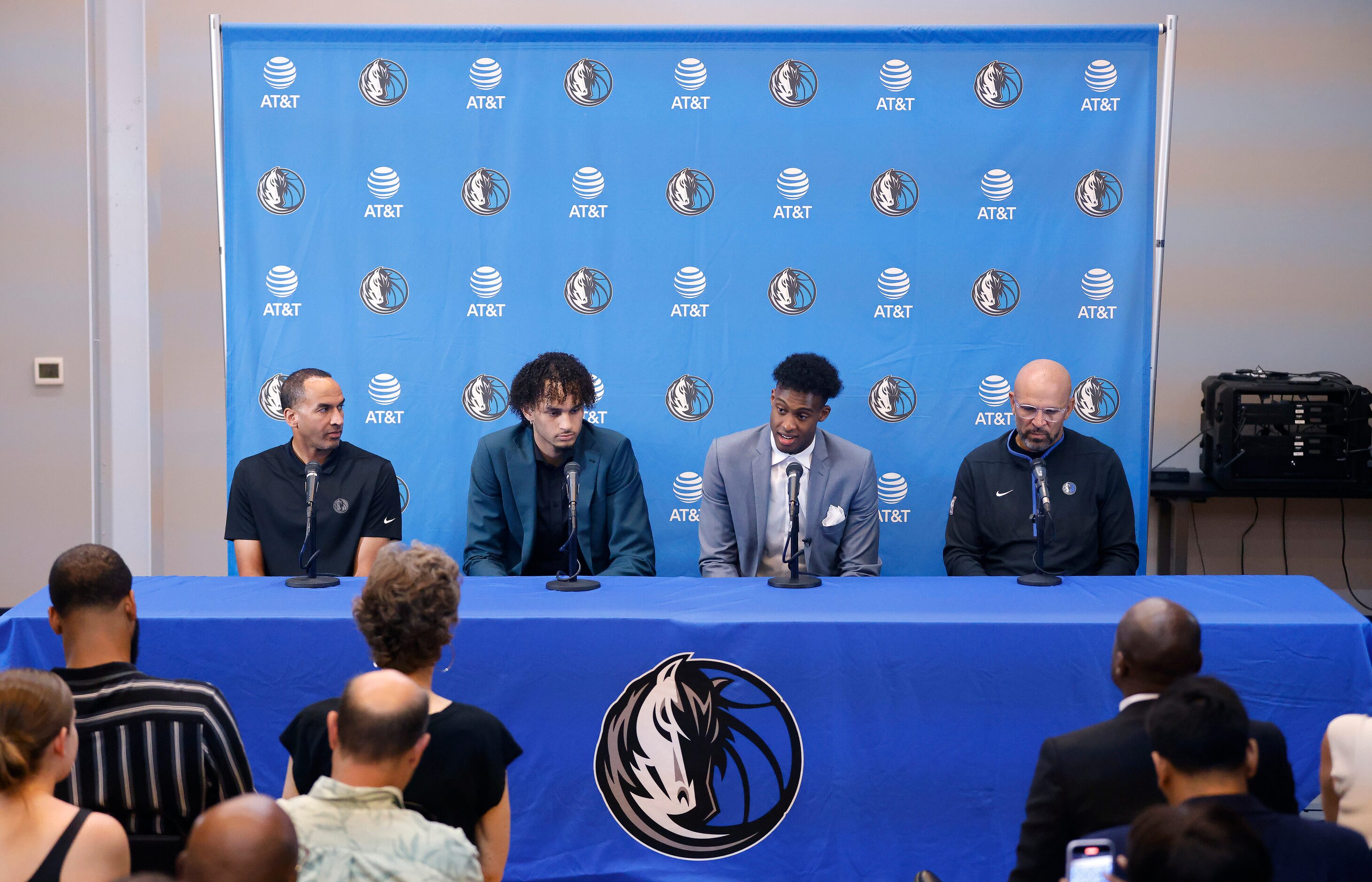 Newly drafted Dallas Mavericks players Dereck Lively II of Duke (center, left) and...