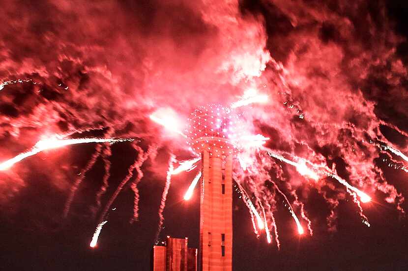 Guests view fireworks during The Reunion event in downtown Dallas on Oct. 9, 2015. The event...