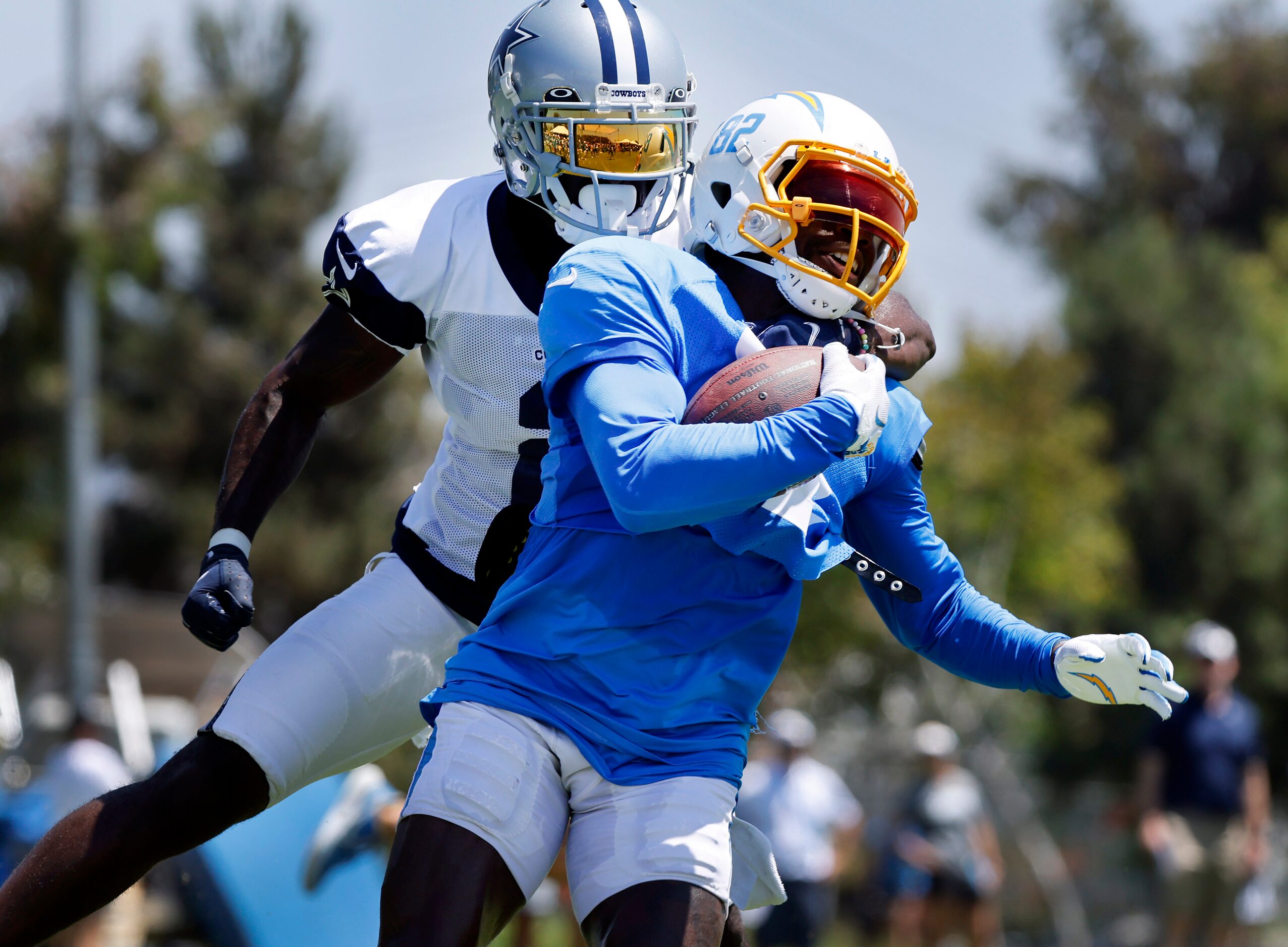 Dallas Cowboys cornerback Jourdan Lewis (2) tackles Los Angeles Chargers wide receiver...