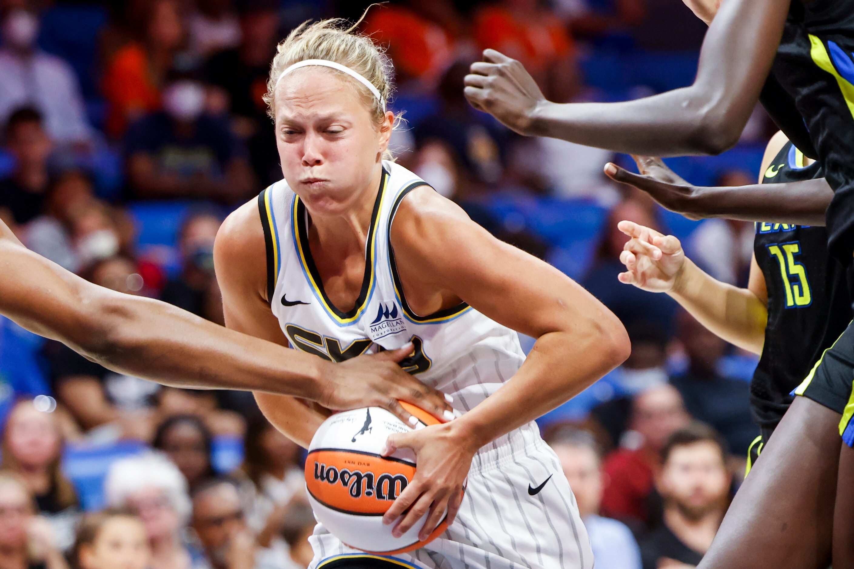 Chicago Sky forward Azura Stevens runs past Dallas Wings defenders during the second half of...