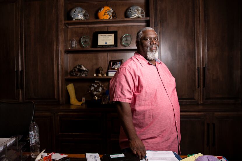 Former Cowboys defensive tackle Russell Maryland poses for a photo at his home in Southlake...
