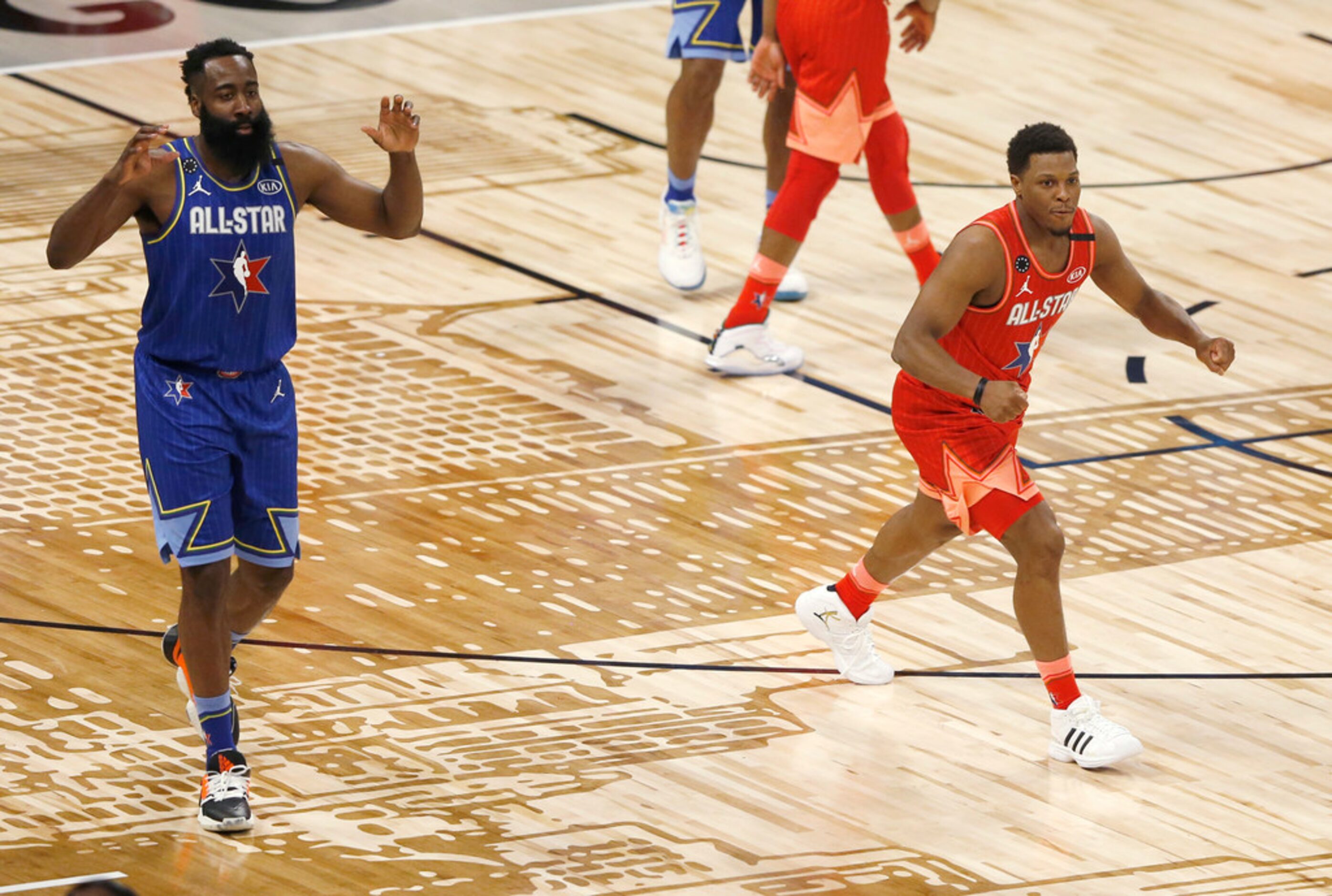 Team Giannis' Kyle Lowry (24) celebrates after Team LeBron's James Harden (2) is called for...