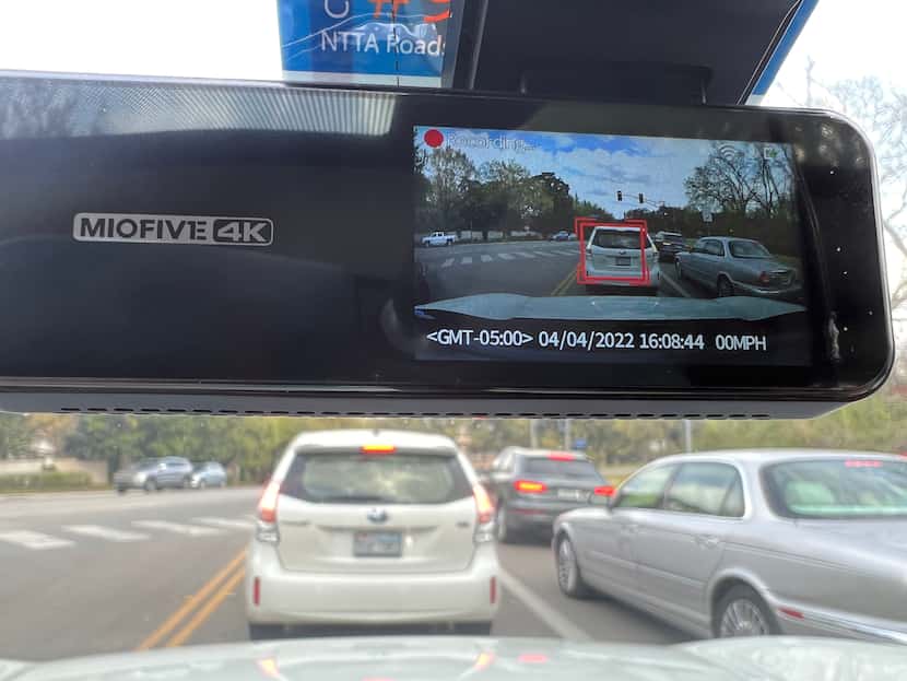 The red box on the screen indicates that Miofive has identified a car ahead of you. The dash...
