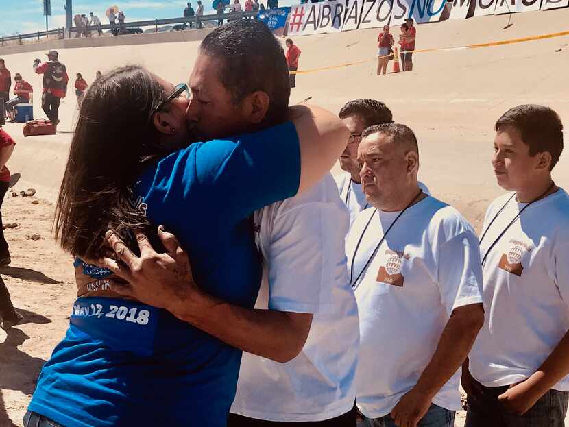 Alejandra Guerrero Hernandez hugs her brother Humberto on Saturday, during a family...