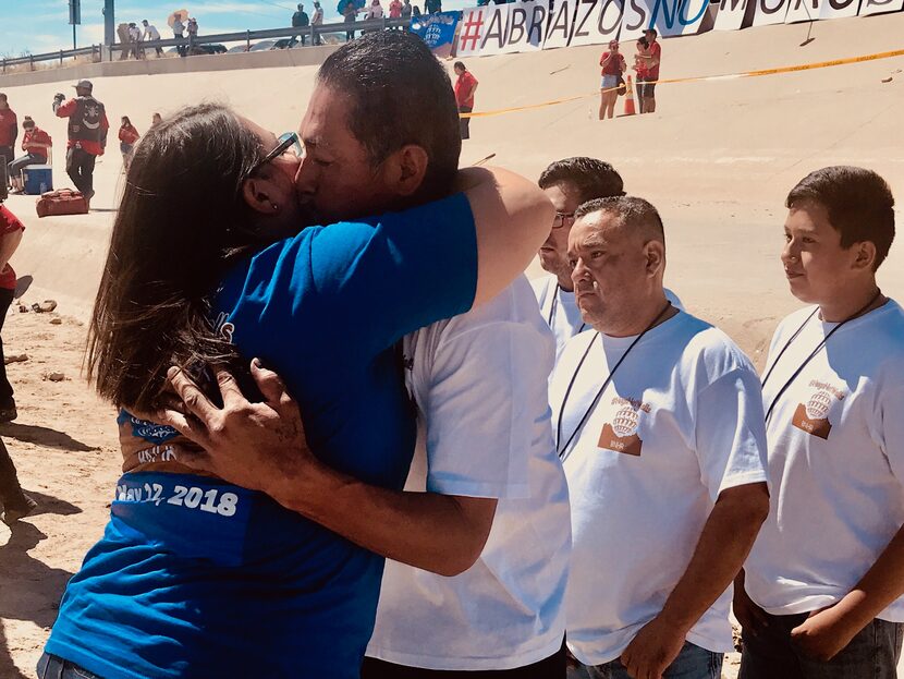 Alejandra Guerrero Hernandez hugs her brother Humberto on Saturday, during a family...