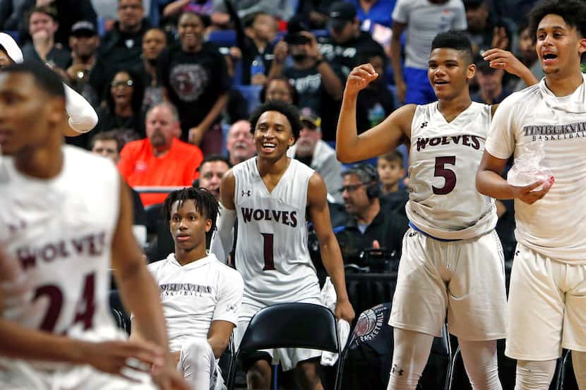 Mansfield Timberview starters cheer on reserve late in game including Mansfield Timberview's...