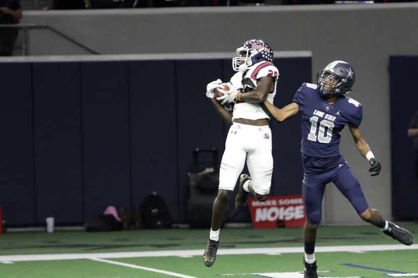 Ryan player #29, Chance Rucker, grabs an interception that was meant for Lone Star player...