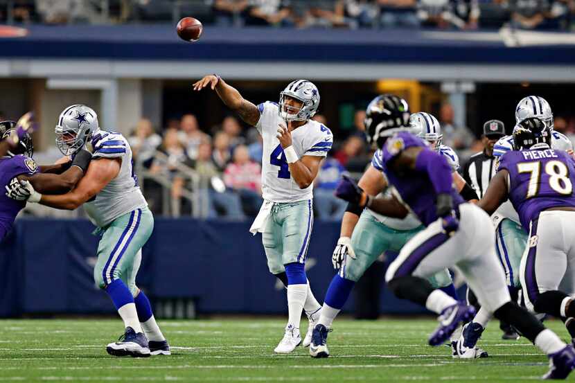 Dallas Cowboys quarterback Dak Prescott (4) passes during the second half of Dallas' 27-17...