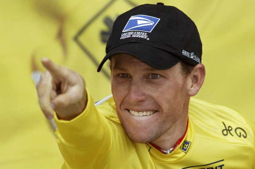 Lance Armstrong on the podium after winning the 15th stage of the 90th Tour de France on...