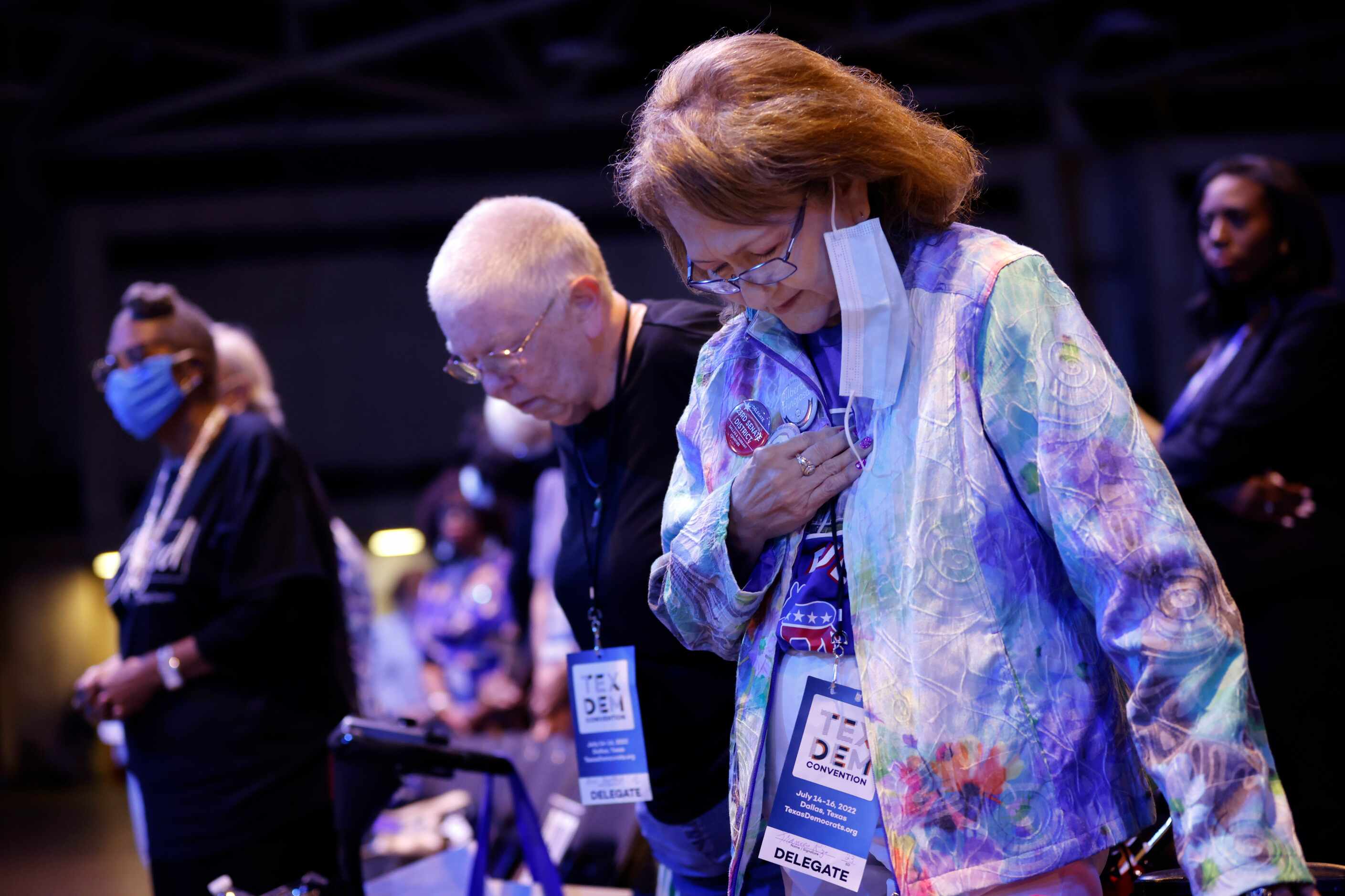 Delegate Frances Rizo of Duncanville bows her head in prayer as the invocation is delivered...