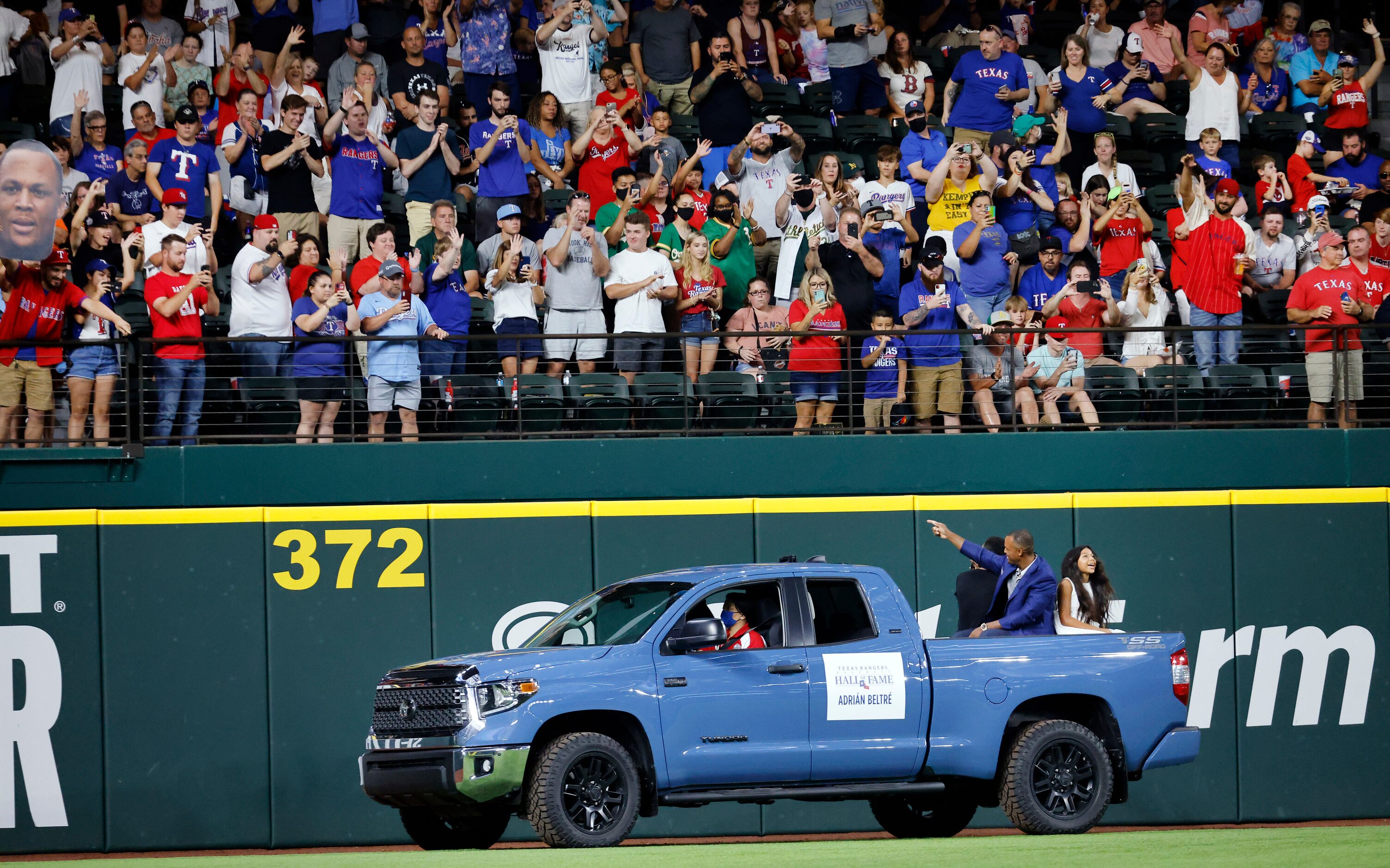 With his kids in the back of a pickup truck, former Texas Rangers third baseman Adrian...