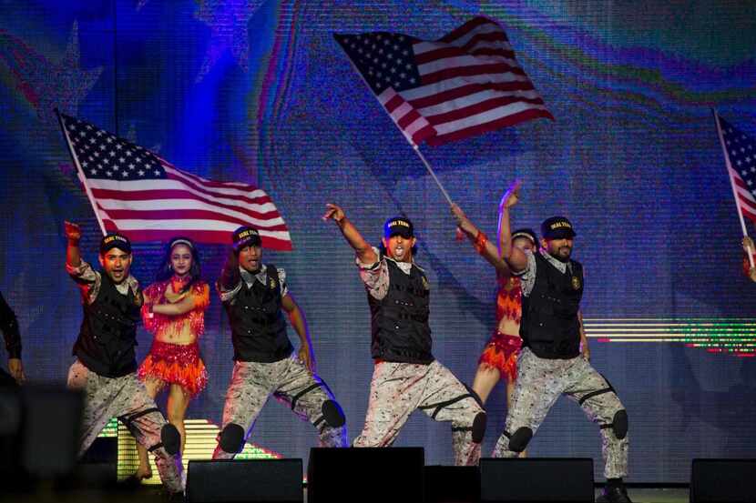 Performers dance to a Bollywood rendition of Bruce Springsteen's hit song "Born in the USA"...