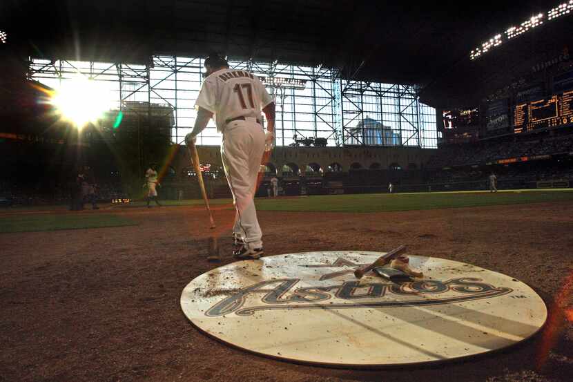 Houston's Lance Berkman walks to home plate from the on-deck circle during the...