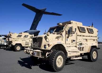 In this Nov. 28, 2007, file photo, mine-resistant, ambush-protected vehicles (MRAP),...