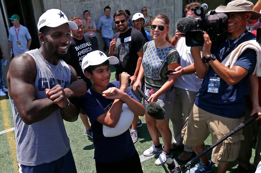 Dallas Cowboys wide receiver Dez Bryant (left) and 11-year-old Nihar Janga, co-champion of...
