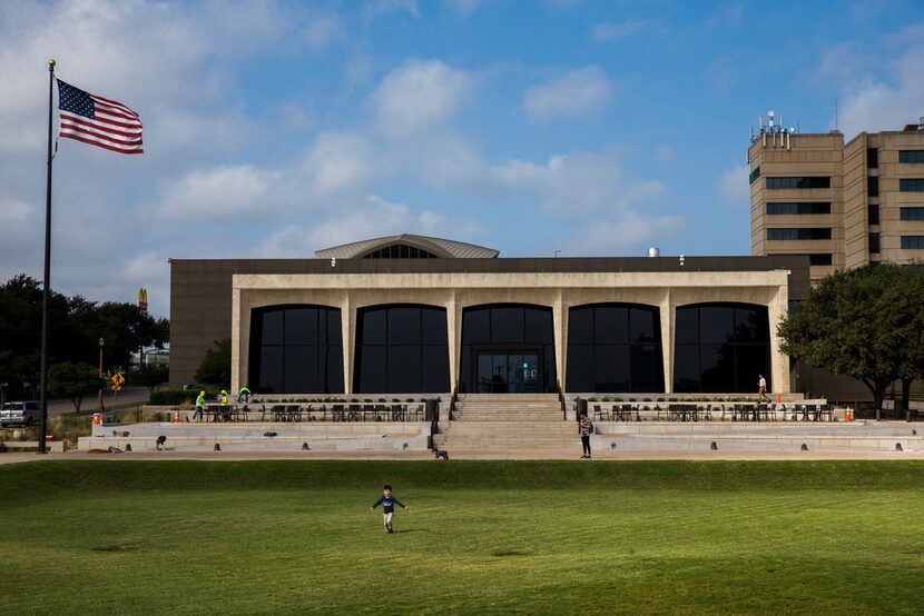 Ashton Morgan, 4, runs through the grass in front of the Amon Carter Museum of American Art...