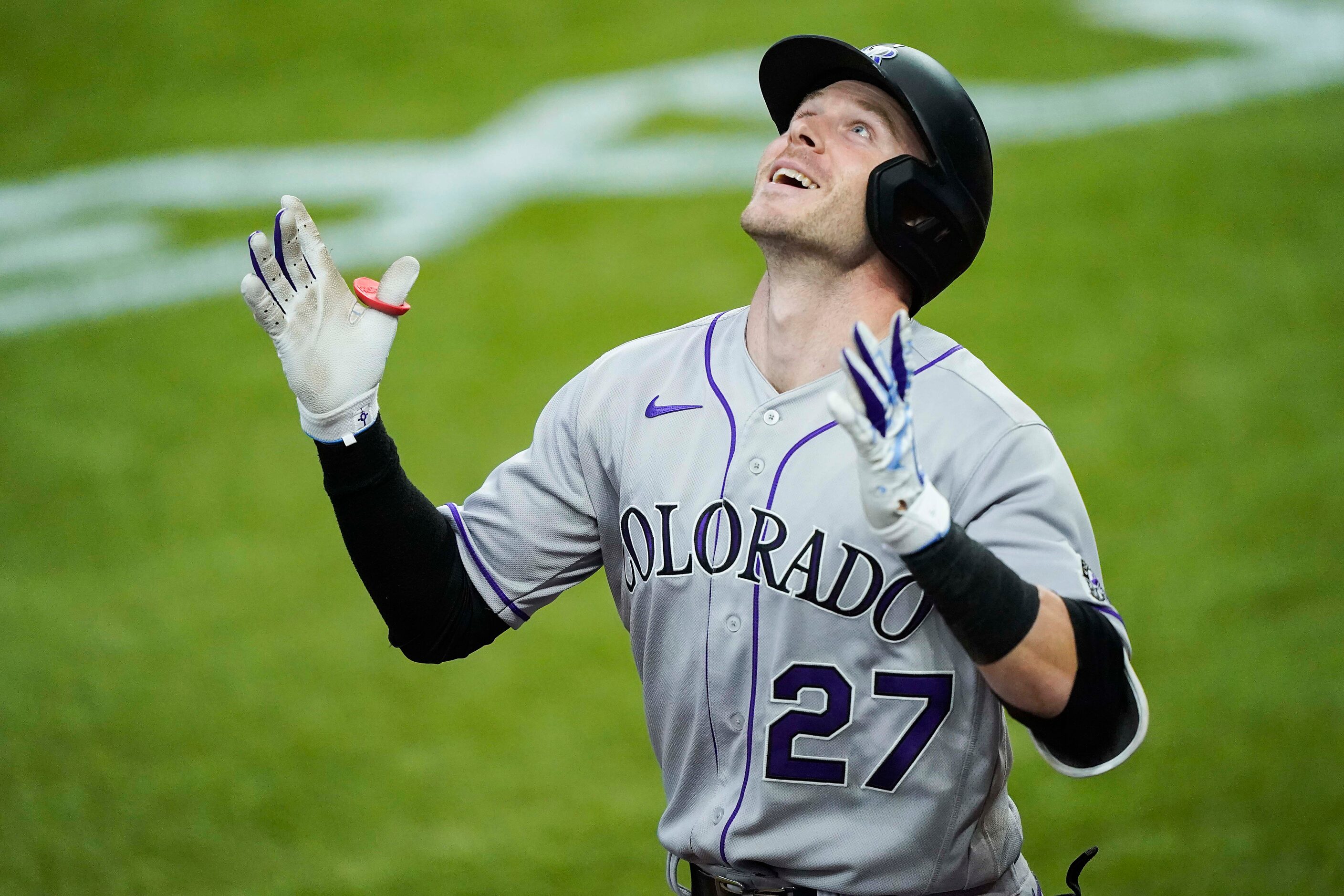 Colorado Rockies shortstop Trevor Story celebrates after hitting a 2-run home run during the...