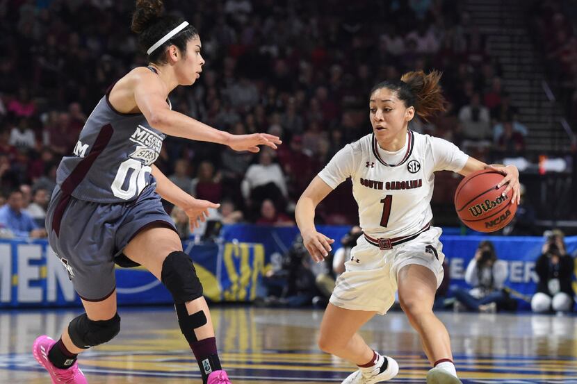 South Carolina guard Bianca Cuevas-Moore (1) looks to drive against Mississippi State guard...
