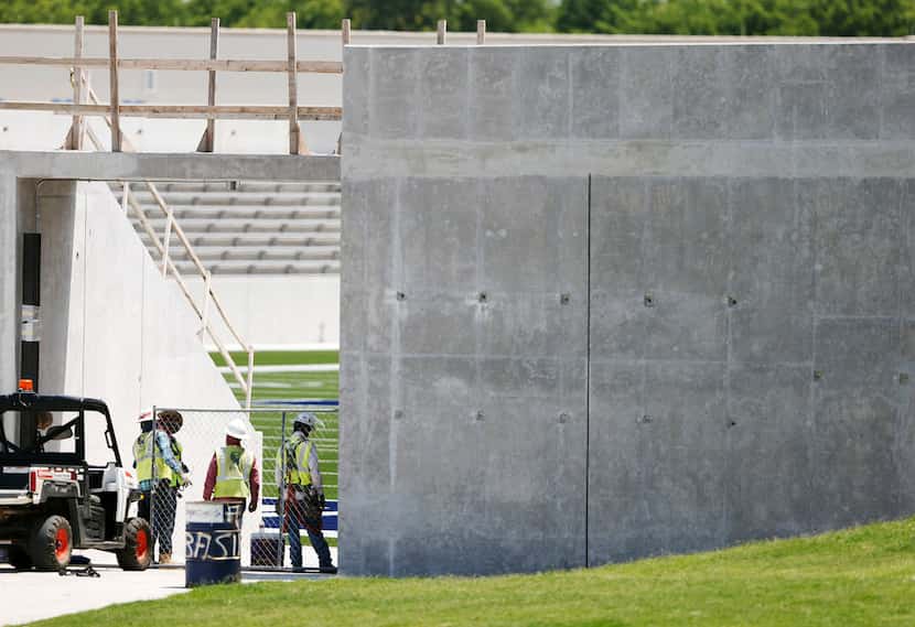 Construction continued at McKinney ISD Stadium in McKinney on Friday. Excessive cracking has...