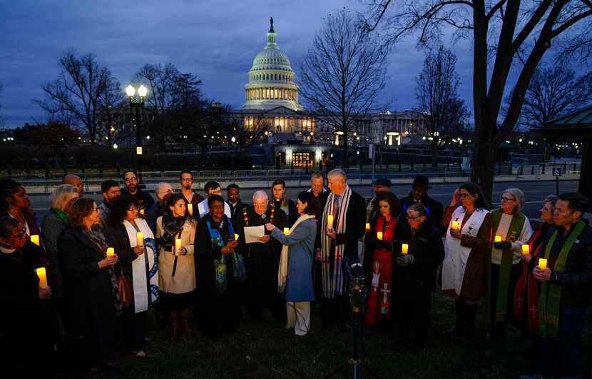 Christian leaders gather for a prayer vigil to mark the second year anniversary of the...