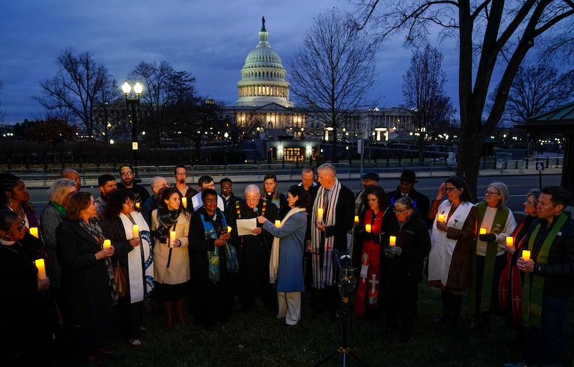 Christian leaders gather for a prayer vigil to mark the second year anniversary of the...