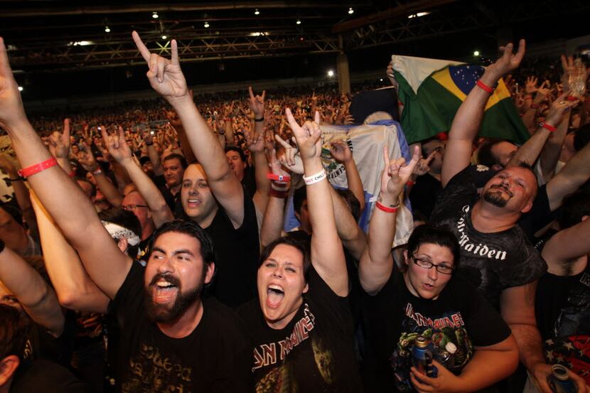Fans cheer as Iron Maiden performs at Gexa Energy Pavillion in Dallas, TX, on Aug. 17, 2012.