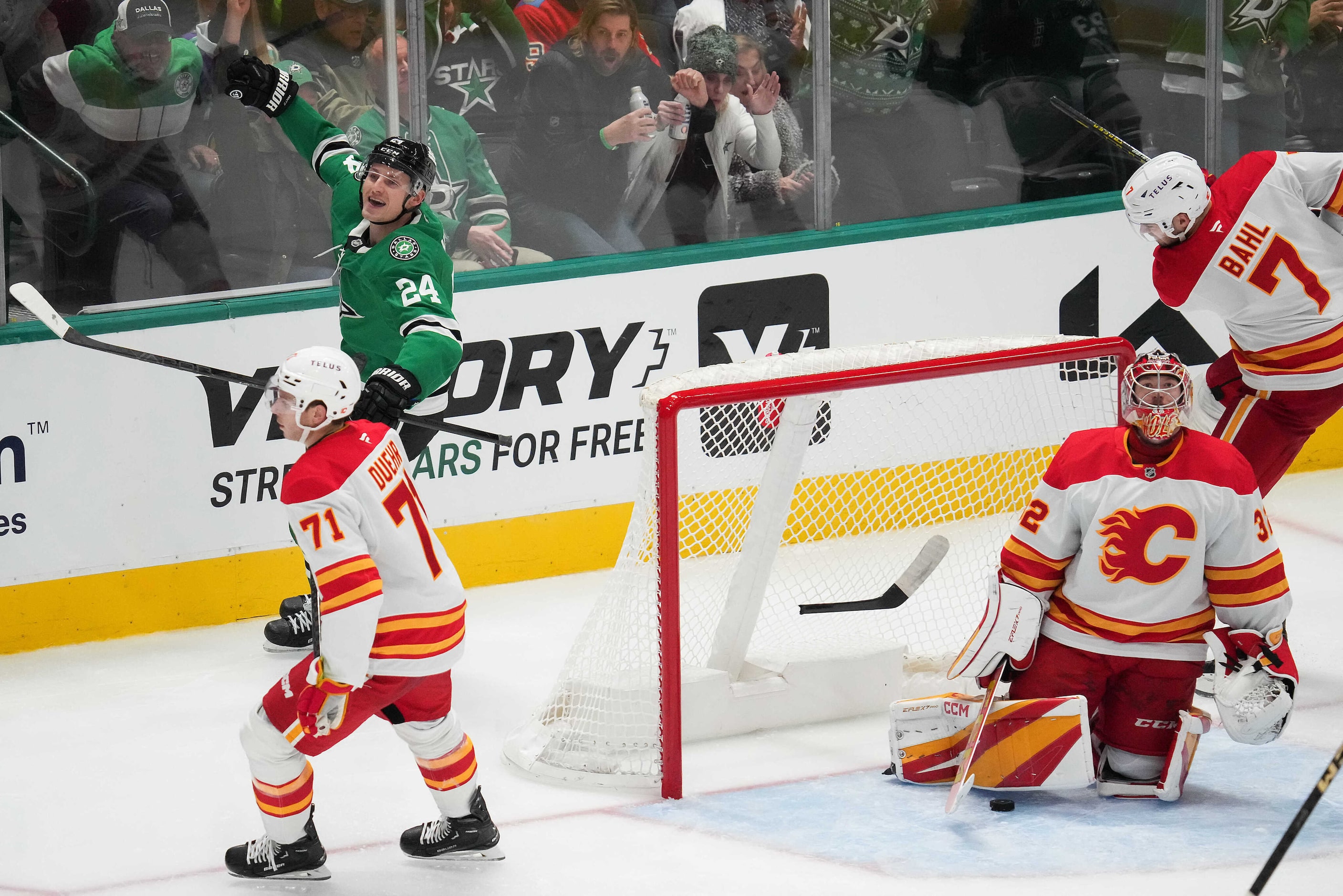 Dallas Stars center Roope Hintz (24) celebrates after beating Calgary Flames goaltender...