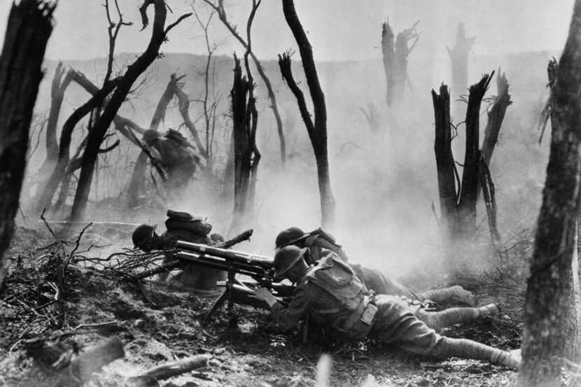  American soldiers advance against German positions during World War I, in 1918.  