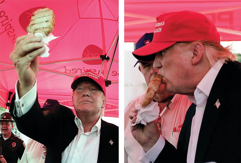 Republican presidential candidate Donald Trump eats a pork chop on a stick at the Iowa State...