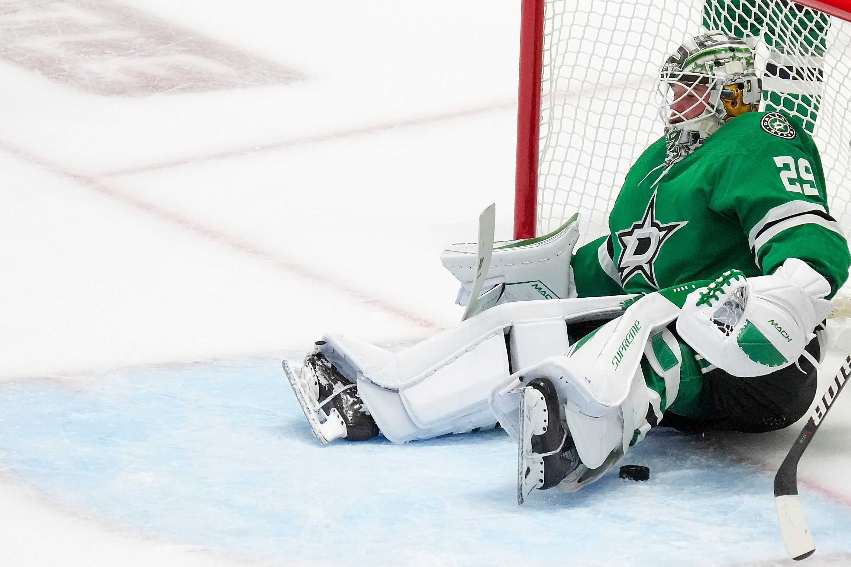 Dallas Stars goaltender Jake Oettinger (29) reacts after a goal by Vegas Golden Knights...