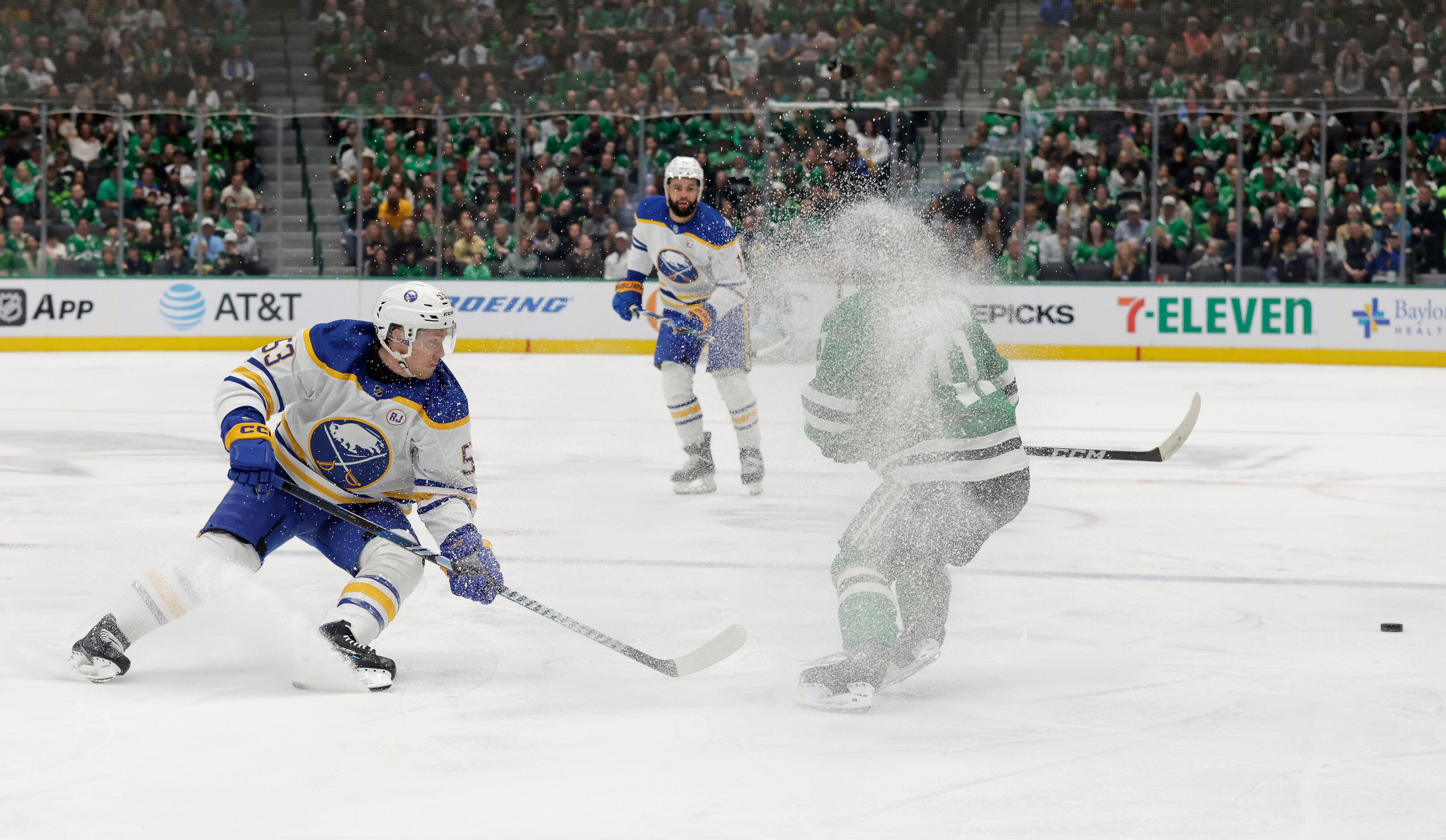 Dallas Stars center Logan Stankoven (11) turns back the puck from Buffalo Sabres left wing...