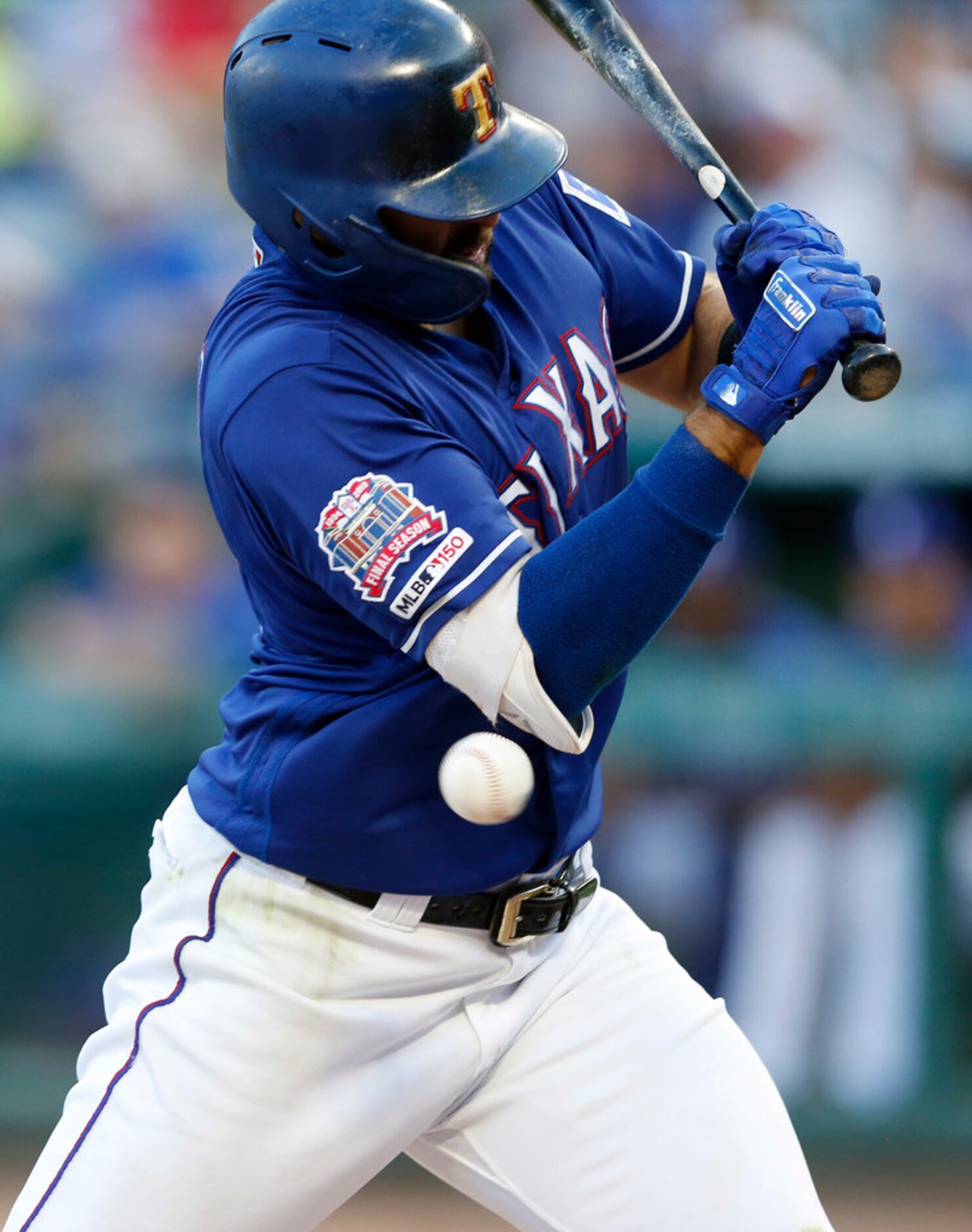 Texas Rangers left fielder Joey Gallo (13) reacts after getting hit by a pitch from Los...