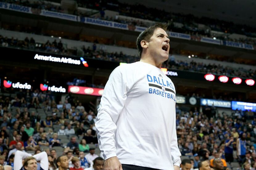 Dallas Mavericks owner Mark Cuban argues a call in the second half of NBA Basketball action...