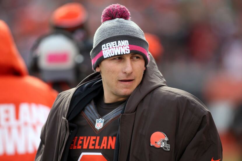 In this Sunday, Oct. 18, 2015, photo Cleveland Browns quarterback Johnny Manziel watches on...