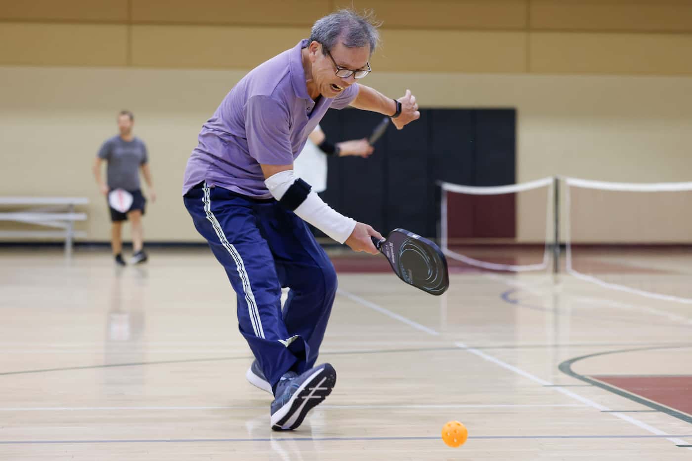 Tet Wu of Plano reacts as he misses to hit during a pickle ball game on Friday, May 26, 2023...