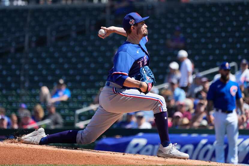 Texas Rangers starting pitcher Andrew Heaney throws against the Chicago Cubs during the...