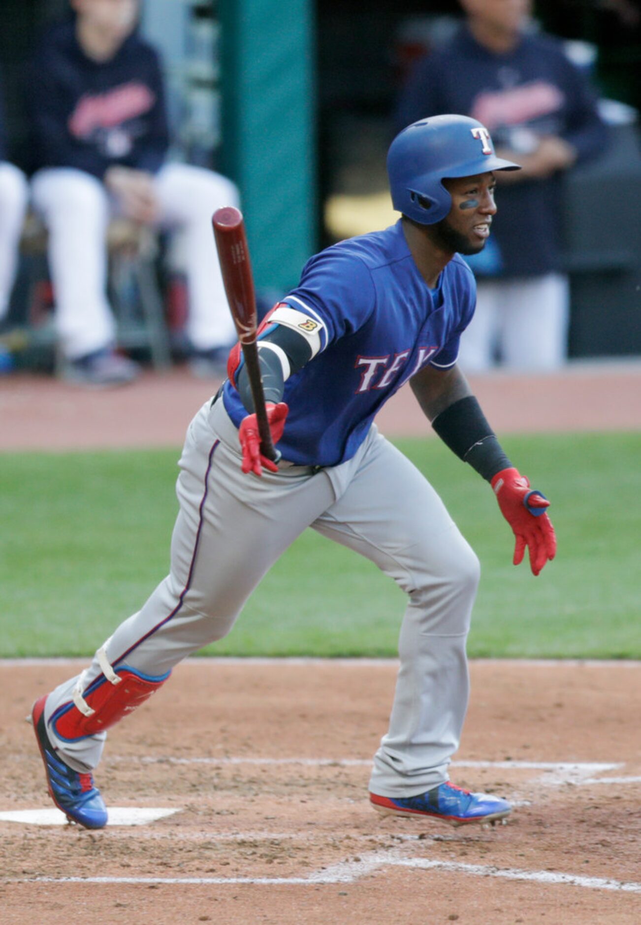 Texas Rangers' Jurickson Profar watches his ball after hitting a single off Cleveland...