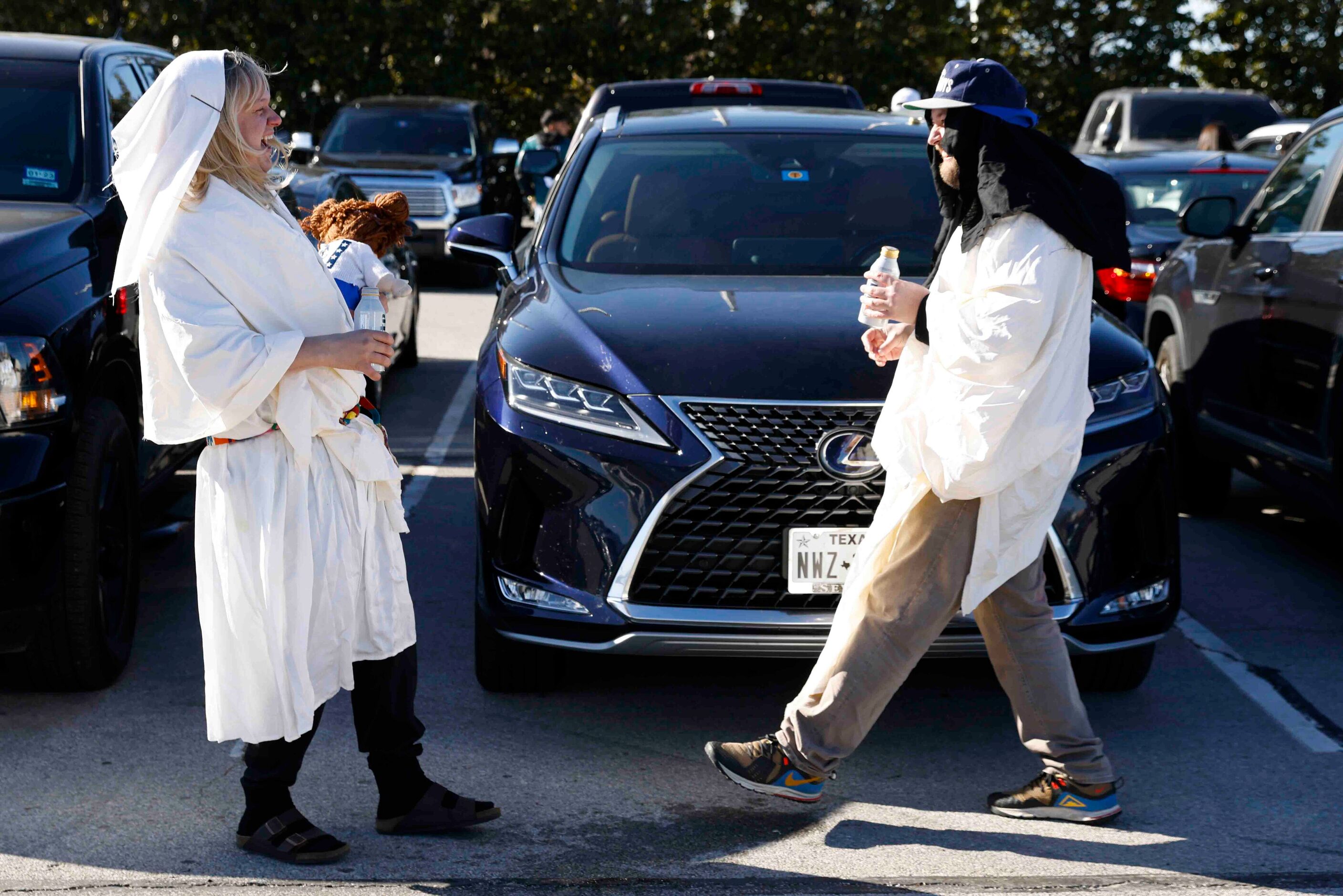 Jacob Wilson, left, and Chris Jeracie  tails gait ahead of a NFL game between Dallas Cowboys...