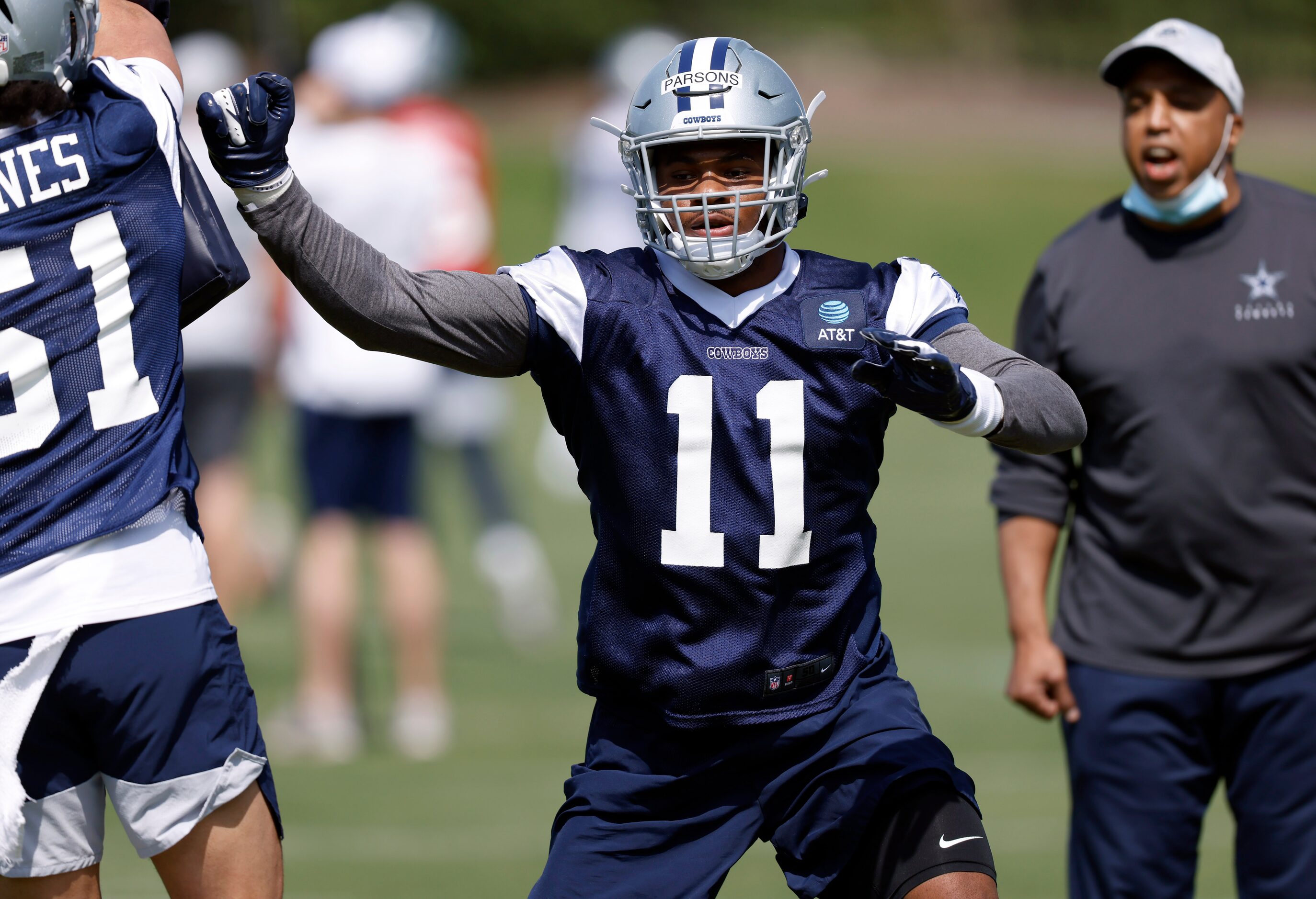 Dallas Cowboys rookie linebacker Micah Parsons (11) faces off against linebacker Anthony...