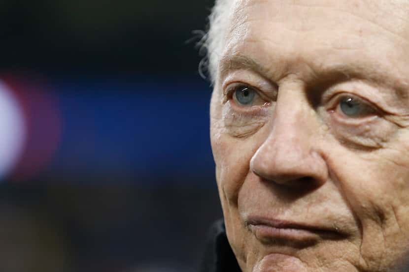 Dallas Cowboys owner Jerry Jones converses along the sidelines prior to a NFL matchup...